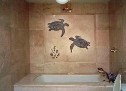 two overlay turtles on tub wall